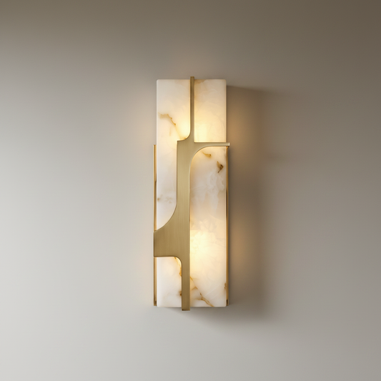 studio shot of rectangular marble wall lamp with sculpted iron frame