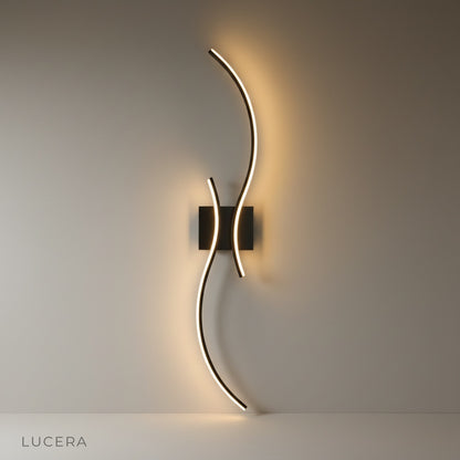 studio shot of Ulric wireless wall lamp front view on clean neutral background