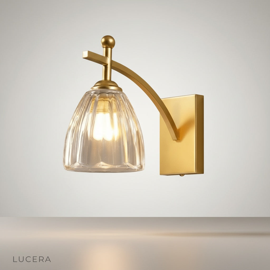 Canon wall lamp brushed gold curved iron arm in modern bedroom