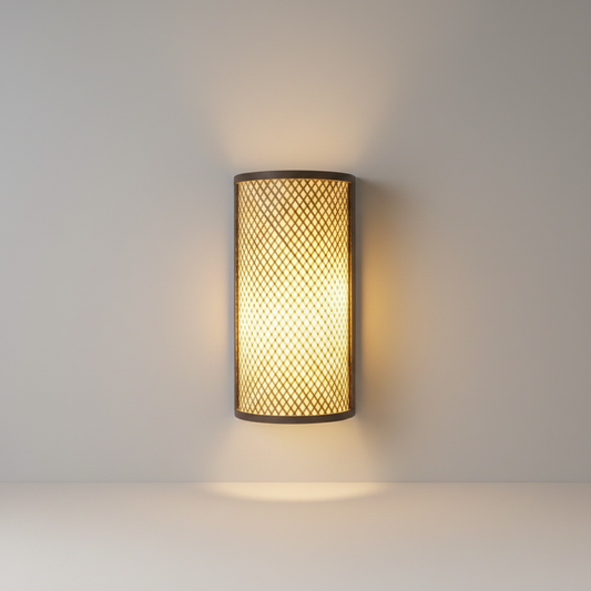 studio shot of Villanelle wall lamp with fabric shade and bamboo frame on neutral background