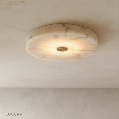 Yolande alabaster ceiling light glowing in modern living room with copper accent