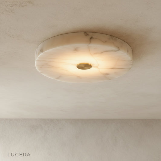 Yolande alabaster ceiling light glowing in modern living room with copper accent