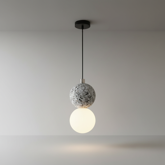 studio shot of Xanadu pendant light front view with stacked opal glass and terrazzo design
