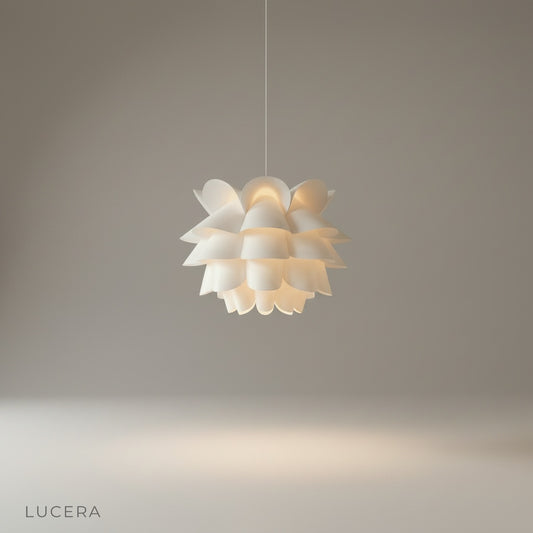 studio shot of white Oblation pendant light against clean neutral background