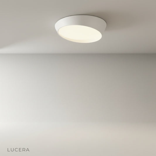 studio shot of circular alabaster ceiling light with frosted acrylic diffuser on clean white background