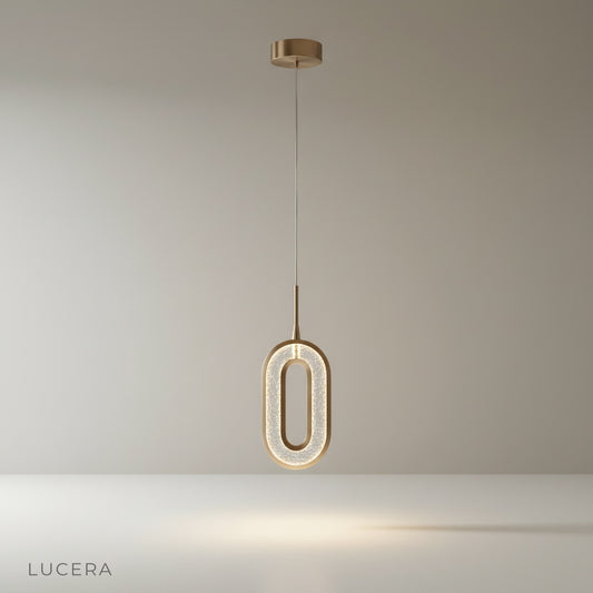 Warmth Pendant Light by Lucera glowing over a modern dining table in a cozy interior