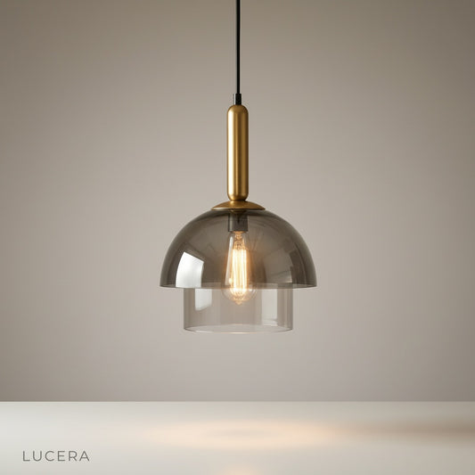 studio shot of Chateau pendant light with layered glass and iron frame