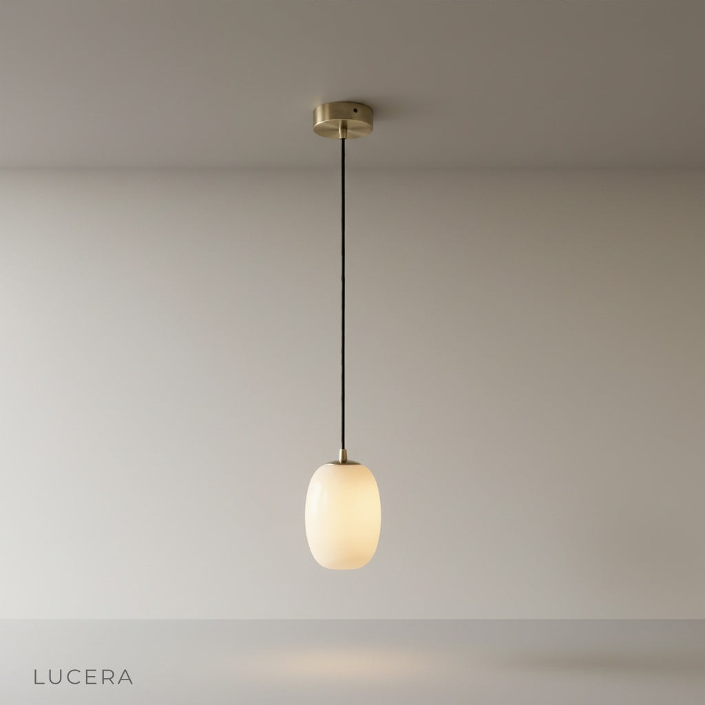 Studio shot of Embellish Alabaster pendant light with snowflake-inspired gypsum shade on clean white background