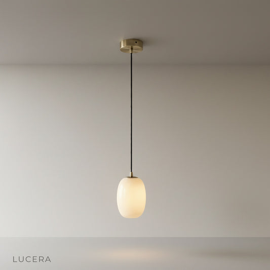 Studio shot of Embellish Alabaster pendant light with snowflake-inspired gypsum shade on clean white background