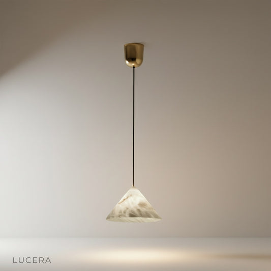 Studio shot of Herald Alabaster Pendant Light with white alabaster shade against clean light gray background