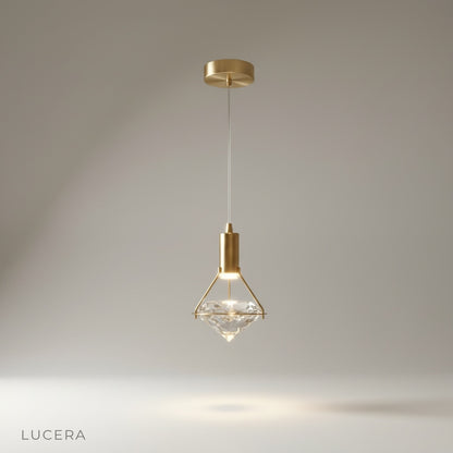studio shot of Silas pendant light with metallic gold iron frame and crystal detail