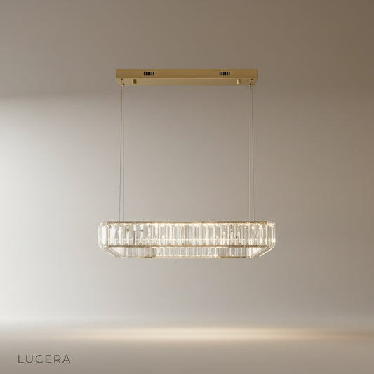 studio shot of Benedetta chandelier with stainless steel frame and clear crystals