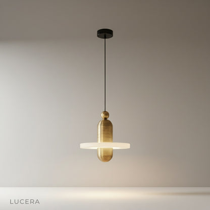 studio shot of Marianist pendant light with fluted aluminum frame and alabaster shade