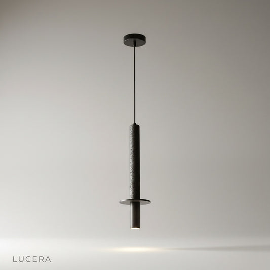 Studio shot of Sally pendant light with natural travertine column and aluminum cap