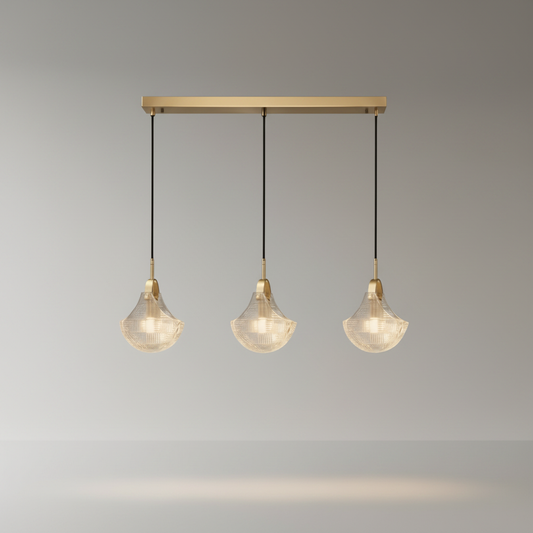 studio shot Leggero pendant light three sculptural glass covers brushed copper hardware