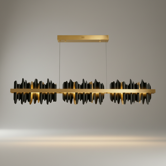 Studio shot of the Yield Linear Chandelier in gold finish against a clean white background