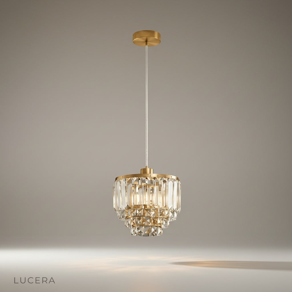 Studio shot of diamond pendant light centered on clean white background showing full design