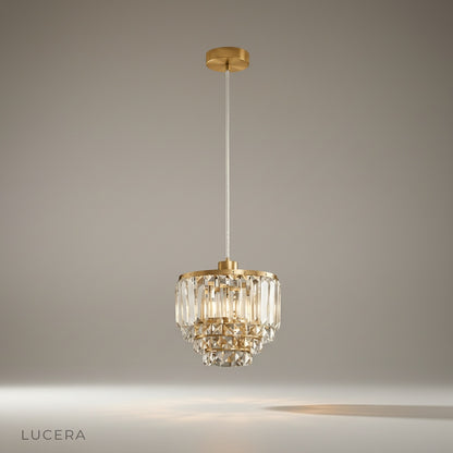 Studio shot of diamond pendant light centered on clean white background showing full design