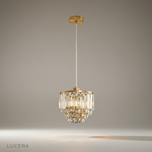 Studio shot of diamond pendant light centered on clean white background showing full design