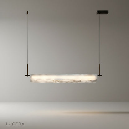 Studio shot of the Parlor alabaster pendant light against a clean white background