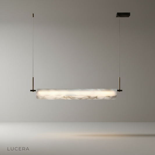 Studio shot of the Parlor alabaster pendant light against a clean white background