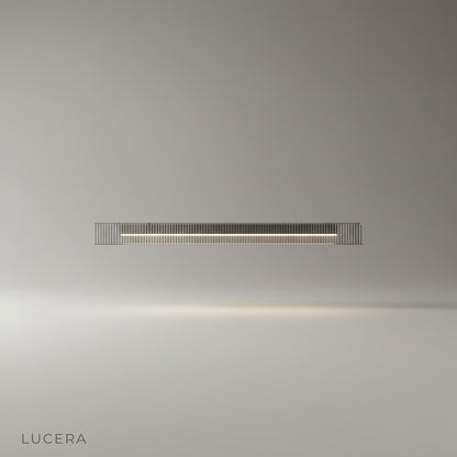 studio shot of black iron linear chandelier with clear glass shades on white background