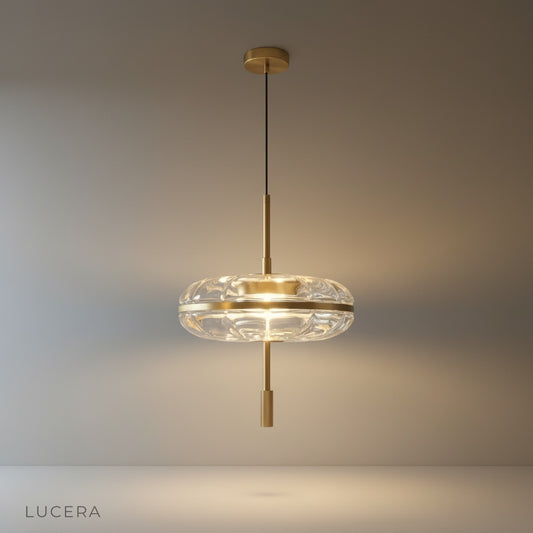 studio shot of Gemini pendant light with rippled glass shade and metallic frame