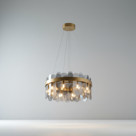 Studio shot of Lucera Rhythm chandelier with five frosted glass shades and gold frame
