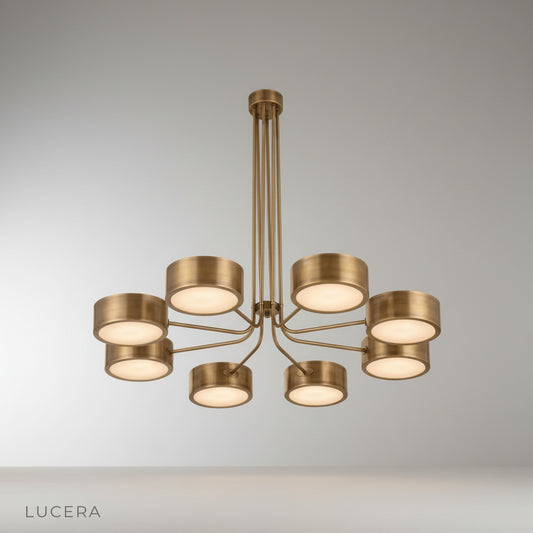 studio shot of Lacrima brass chandelier front view on clean white background