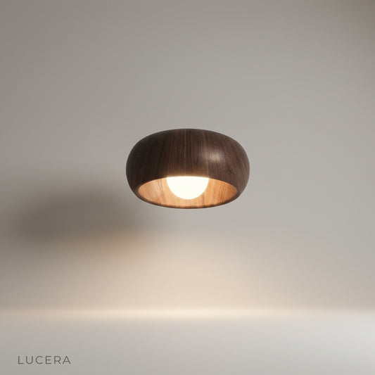 Studio shot of Keen ceiling light front view showing rounded wood and aluminum form