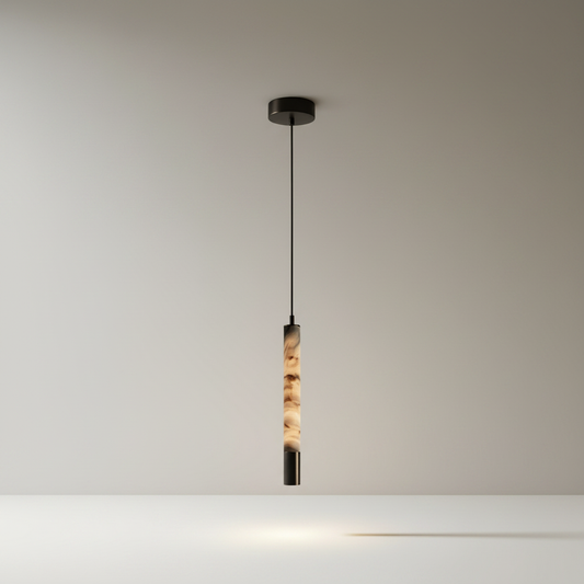 Yseult pendant light studio shot on clean white background showing cylindrical alabaster shade and steel cord