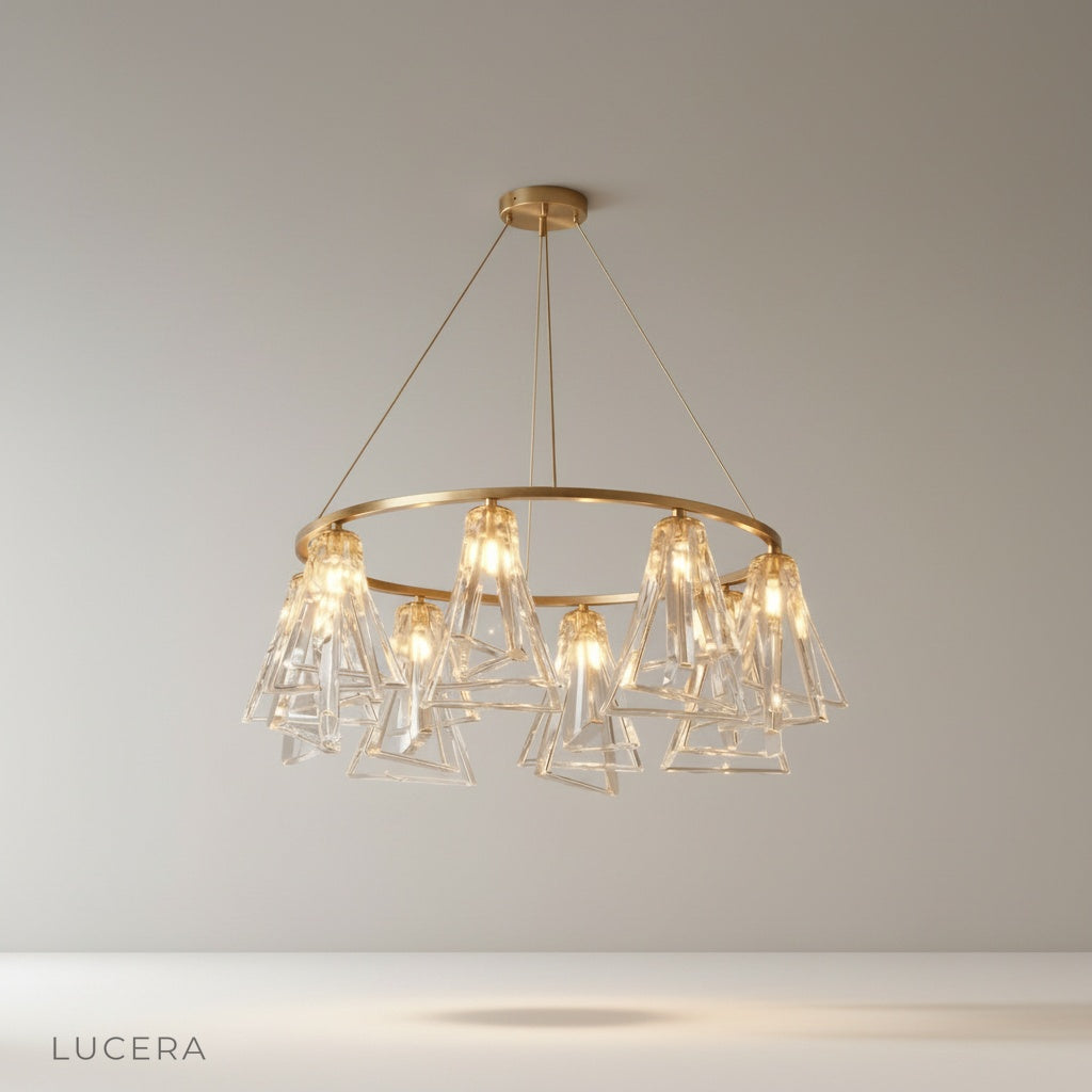 Studio shot of Bruma Chandelier with copper frame and clear crystal shades on clean white background