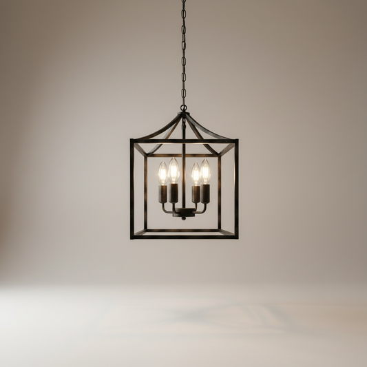 studio shot of black geometric iron frame pendant light with three bulbs