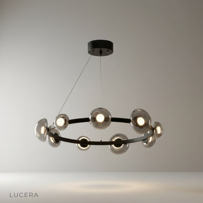 modern round chandelier with copper frame illuminating dining room