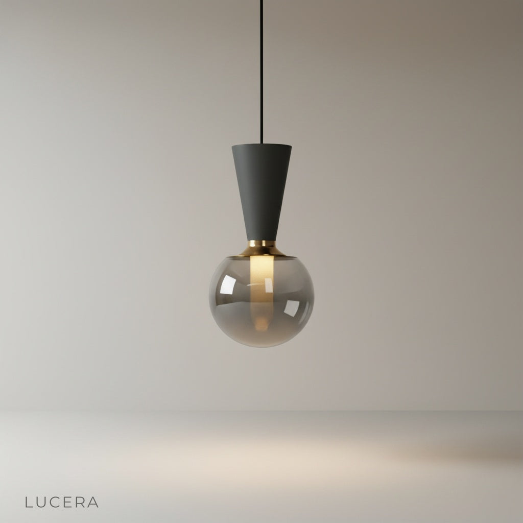 studio shot of Ivan pendant light with concrete cone and smoky glass orb