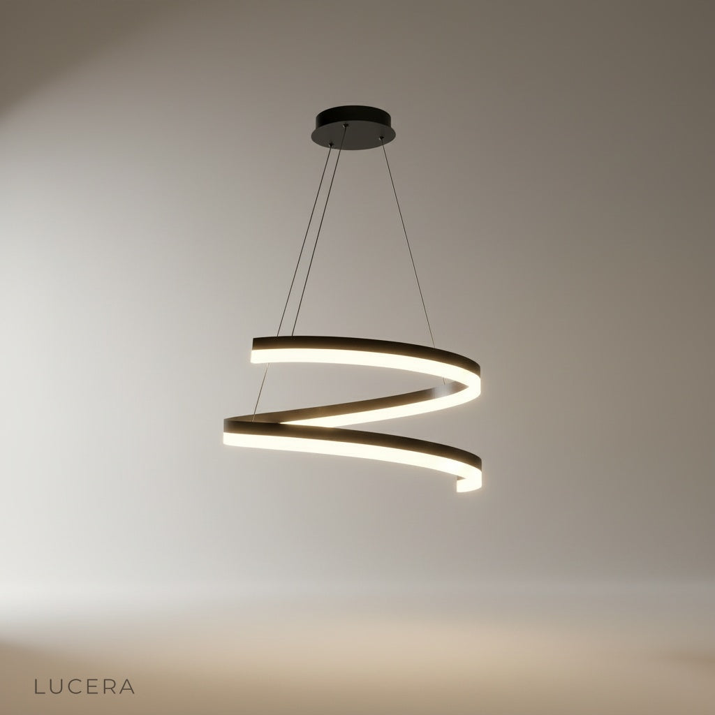 Studio shot of spiral iron and acrylic Hypnotize pendant light against white background