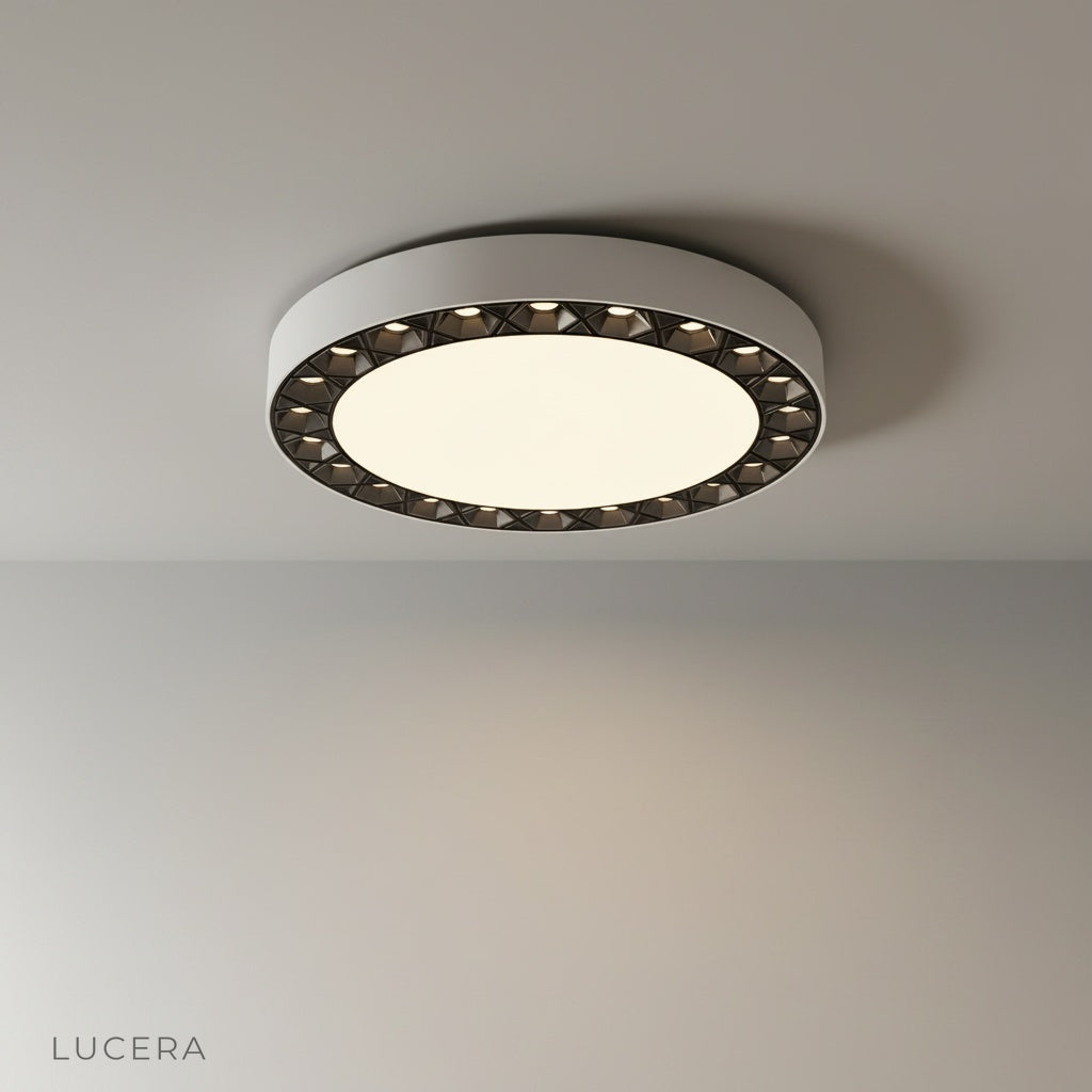 Studio shot of Alonzo ceiling light front view showing circular acrylic and aluminum design