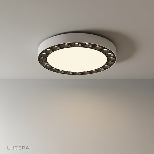 Studio shot of Alonzo ceiling light front view showing circular acrylic and aluminum design