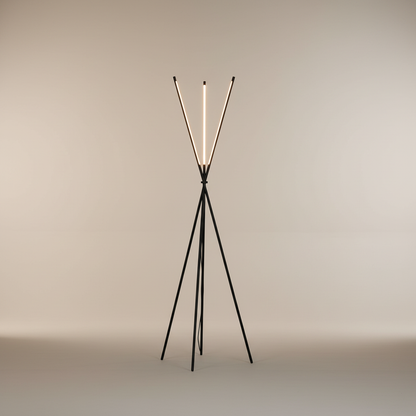studio shot of black LED floor lamp with sleek aluminum and iron tripod stand