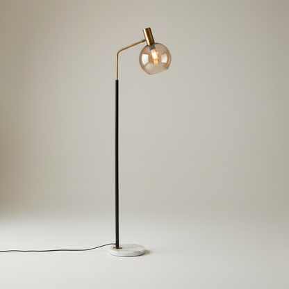 Geneva floor lamp studio shot front view with gold metal arms