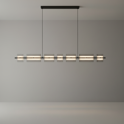 Studio shot of rectangular copper frame chandelier with glass and acrylic diffusers