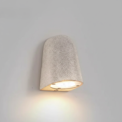 Studio shot of Eos Architectural Microcement Outdoor Wall Light front view on neutral background