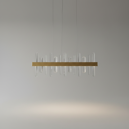 Studio front view of Alma gold chandelier with clear crystal strands on white background