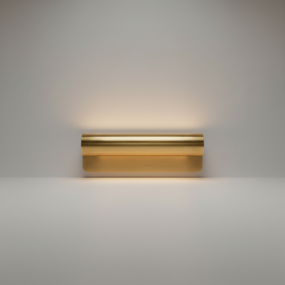 studio shot of Tresse luxury wall lamp brass scroll front view