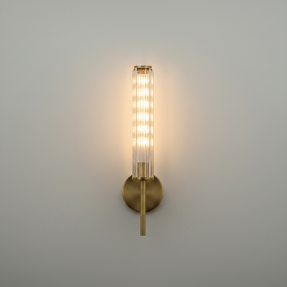 Studio shot of Solo copper wall sconce with linear glass shade on clean white background