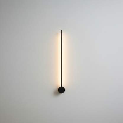 Rinforzando minimalist LED wall lamp glowing warmly in a modern hallway
