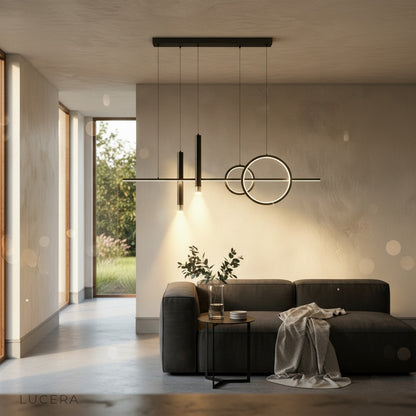 Trim Pendant Light casting diffuse glow over a cozy living room corner with neutral decor