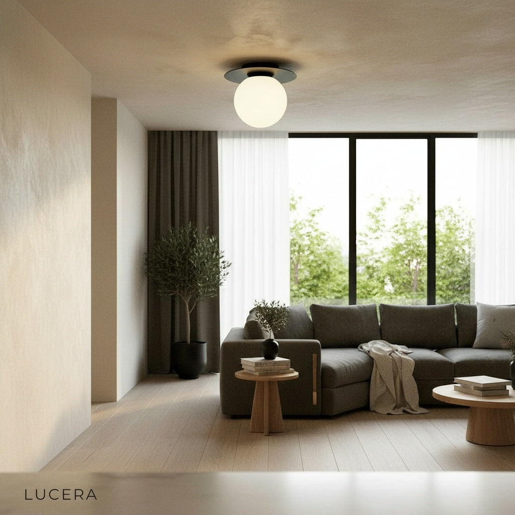 nighttime lifestyle shot of Bijou ceiling light casting warm glow over dining table