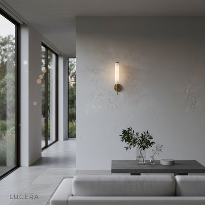 Boreas wall lamp paired with warm wood paneling and linen curtains in serene interior