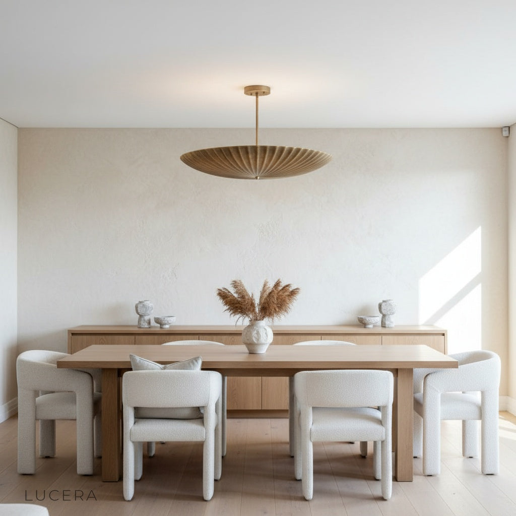Motion Pendant Light lit at dusk in a cozy classic interior with ambient warm glow